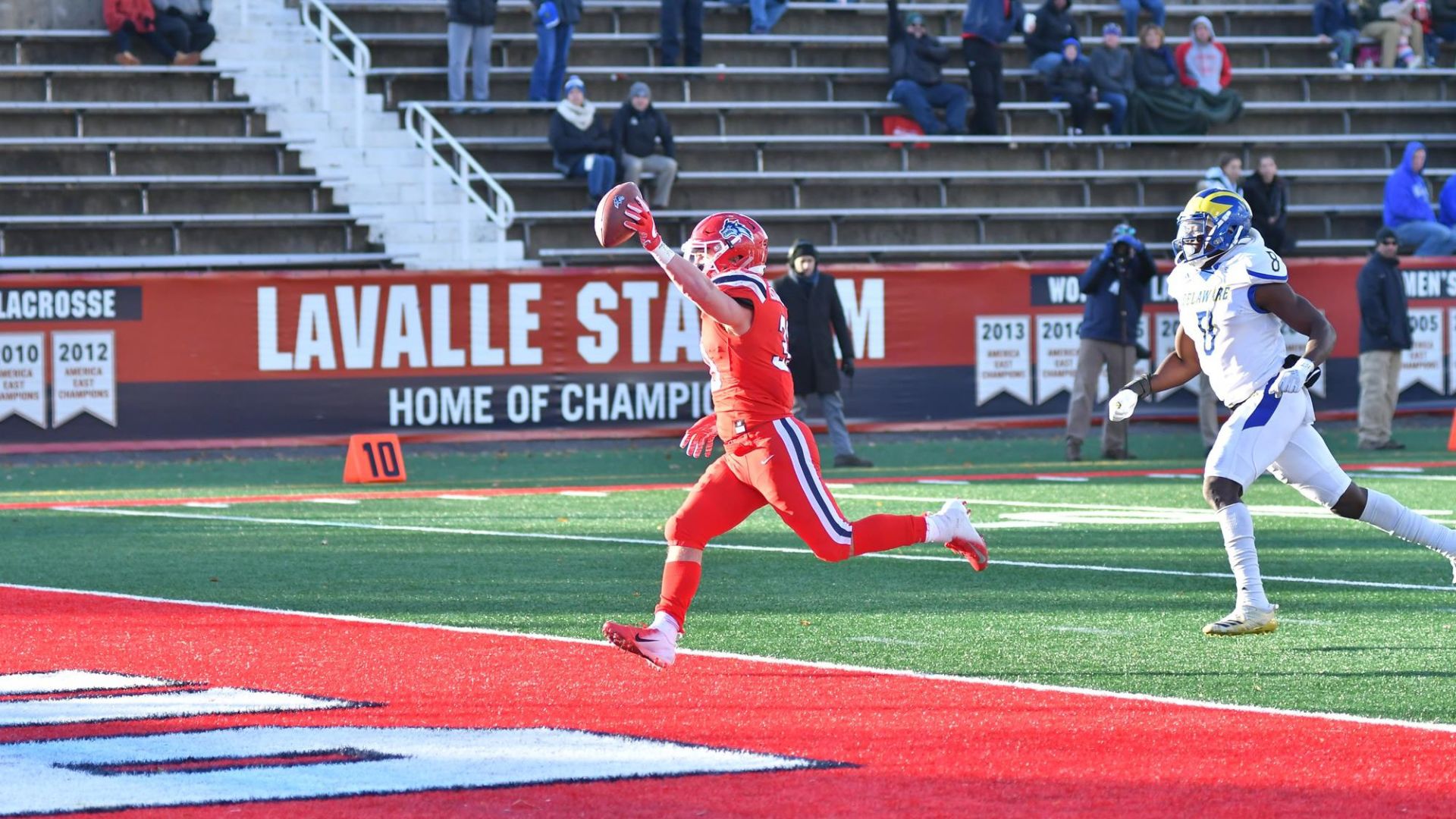 Stony Brook's Donald Liotine runs in a touchdown against Delaware